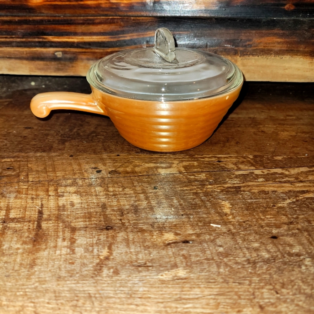 I have four Vintage fire king peach oven bowls.